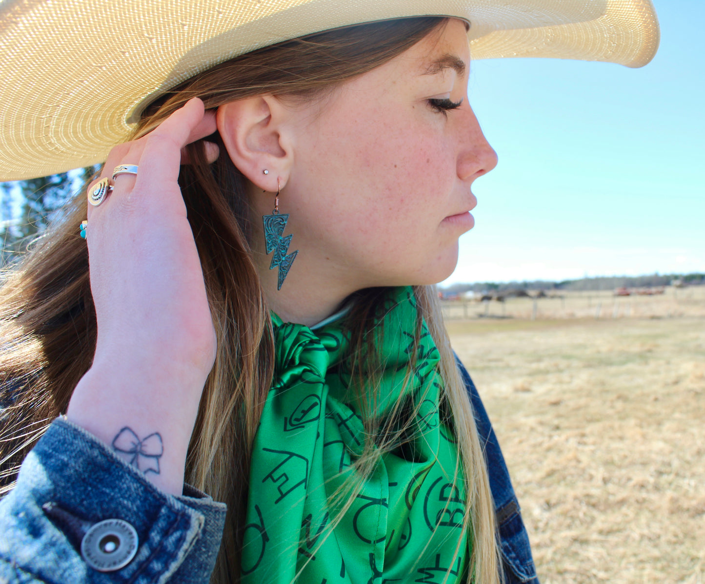 Tooled turquoise lightning bolt earings